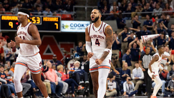 Auburn Tigers forward Johni Broome (4) celebrates a three-pointer as Auburn Tigers take on Missouri Tigers at Neville Arena in Auburn, Ala., on Saturday, Jan. 4, 2025.