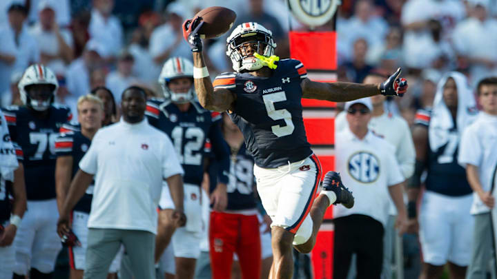 Auburn Tigers wide receiver KeAndre Lambert-Smith (5) catches a pass as Auburn Tigers take on Arkansas Razorbacks at Jordan-Hare Stadium in Auburn, Ala., on Saturday, Sept. 21, 2024. Arkansas Razorbacks defeated Auburn Tigers 24-14.