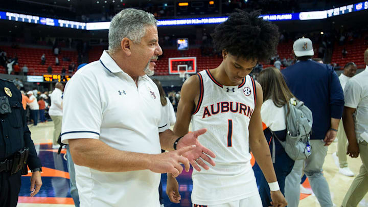 Auburn Tigers head coach Bruce Pearl talks with guard Aden Holloway (1) after the game as Auburn Tigers take on LSU Tigers at Neville Arena in Auburn, Ala., on Saturday, Jan. 13, 2024. Auburn Tigers defeated LSU Tigers 93-78.