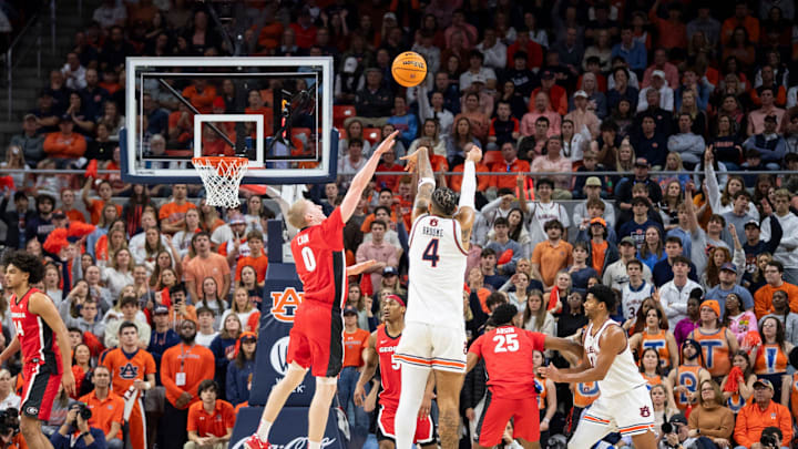 Auburn Tigers forward Johni Broome (4) takes a jump shot as Auburn Tigers take on Georgia Bulldogs at Neville Arena in Auburn, Ala., on Saturday, Feb. 22, 2025. Auburn Tigers lead Georgia Bulldogs 29-24 at halftime.