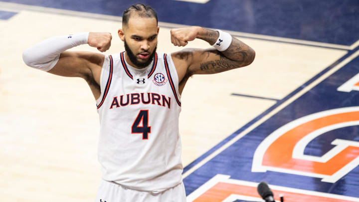 Auburn Tigers forward Johni Broome (4) celebrates an and-one play as Auburn Tigers take on Missouri Tigers at Neville Arena in Auburn, Ala., on Saturday, Jan. 4, 2025. Auburn Tigers defeated Missouri Tigers 84-68.