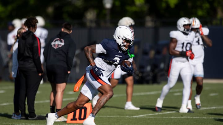 Auburn Tigers wide receiver Perry Thompson (3) runs the ball during football practice at Woltosz Football Performance Center in Auburn, Ala., on Thursday, April 10, 2025.