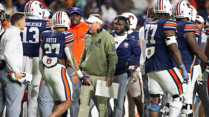 Auburn Tigers head coach Hugh Freeze huddles with his team during a timeout as Auburn Tigers take on Texas A&M Aggies at Jordan-Hare Stadium in Auburn, Ala., on Saturday, Sept. 7, 2024. Auburn Tigers lead Texas A&M Aggies 21-7 at halftime.