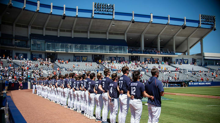 Auburn Tigers players line up for the National Anthem as Auburn Tigers take on Texas A&M Aggies during the SEC baseball tournament at Hoover Met in Birmingham, Ala., on Thursday, May 22, 2025.