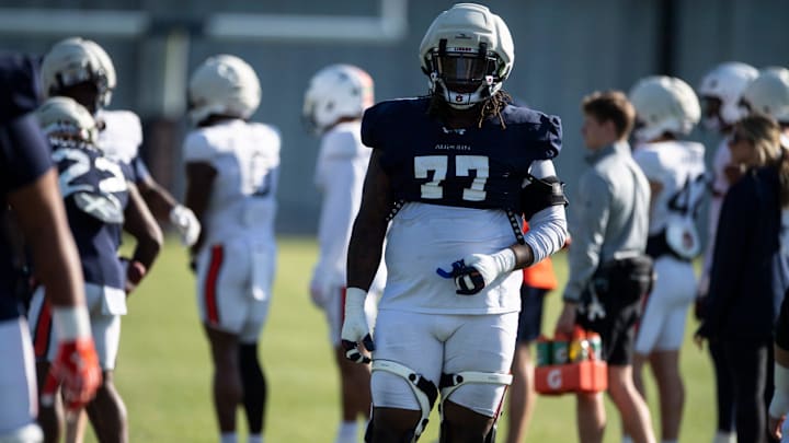 Auburn Tigers offensive lineman Jeremiah Wright (77) during football practice at Woltosz Football Performance Center in Auburn, Ala., on Thursday, April 10, 2025.
