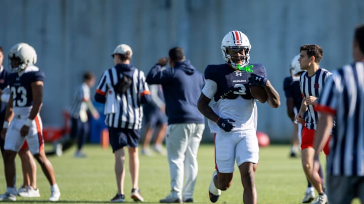 Auburn Tigers wide receiver Perry Thompson (3) runs the ball during football practice at Woltosz Football Performance Center in Auburn, Ala., on Thursday, April 10, 2025.