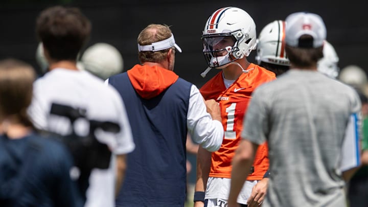 Auburn Tigers head coach Hugh Freeze talks with quarterback Jackson Arnold (11) during practice at Woltosz Football Performance Center in Auburn, Ala. on Thursday, Aug. 14, 2025.