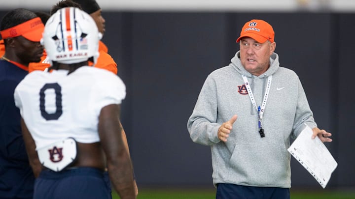 Auburn Tigers head coach Hugh Freeze talks with his team during practice at Woltosz Football Performance Center in Auburn, Ala. on Tuesday, Aug. 26, 2025.