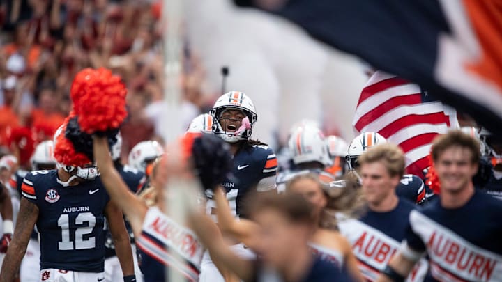 Auburn Tigers players take the field as Auburn Tigers take on Ball State Cardinals at Jordan-Hare Stadium in Auburn, Ala. on Saturday, Sept. 6, 2025. Auburn Tigers defeated Ball State Cardinals 42-3.