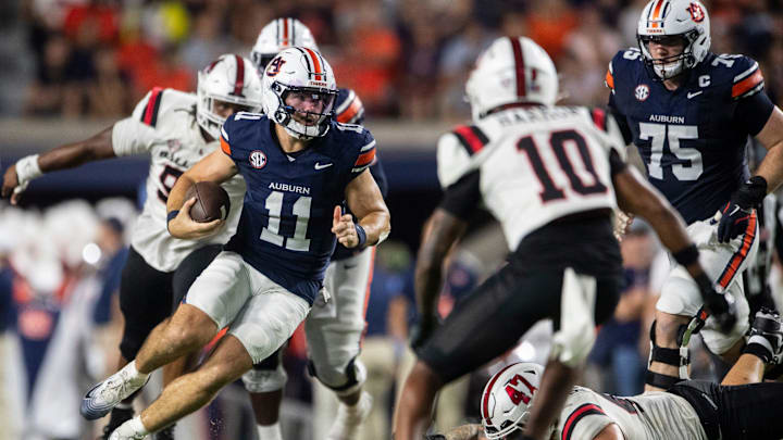 Auburn Tigers quarterback Jackson Arnold (11) runs the ball as Auburn Tigers take on Ball State Cardinals at Jordan-Hare Stadium in Auburn, Ala. on Saturday, Sept. 6, 2025. Auburn Tigers lead Ball State Cardinals 21-0 at halftime.