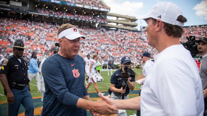 Auburn Tigers head coach Hugh Freeze and South Alabama Jaguars head coach Major Applewhite shake hands after the game as Auburn Tigers take on South Alabama Jaguars at Jordan-Hare Stadium in Auburn, Ala. on Saturday, Sept. 13, 2025. Auburn Tigers defeated South Alabama Jaguars 31-15.