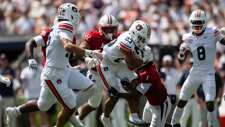 Auburn Tigers running back Jeremiah Cobb (23) runs the ball as Auburn Tigers take on South Alabama Jaguars at Jordan-Hare Stadium in Auburn, Ala. on Saturday, Sept. 13, 2025. Auburn Tigers defeated South Alabama Jaguars 31-15.