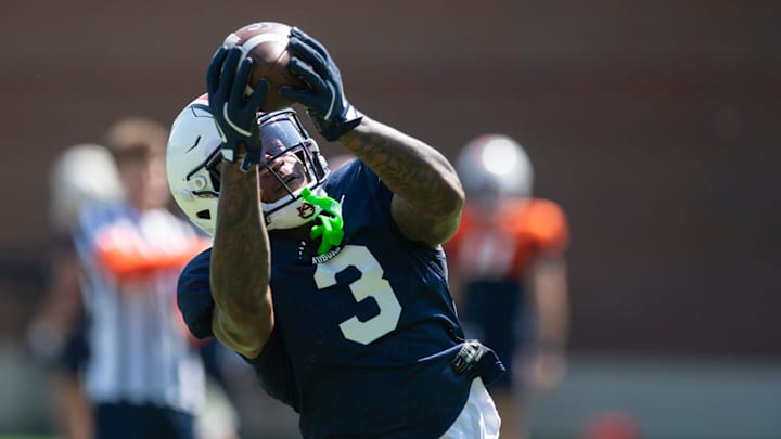 Auburn Tigers wide receiver Perry Thompson (3) catches a pass during practice at Woltosz Football Performance Center in Auburn, Ala. on Tuesday, Aug. 19, 2025.