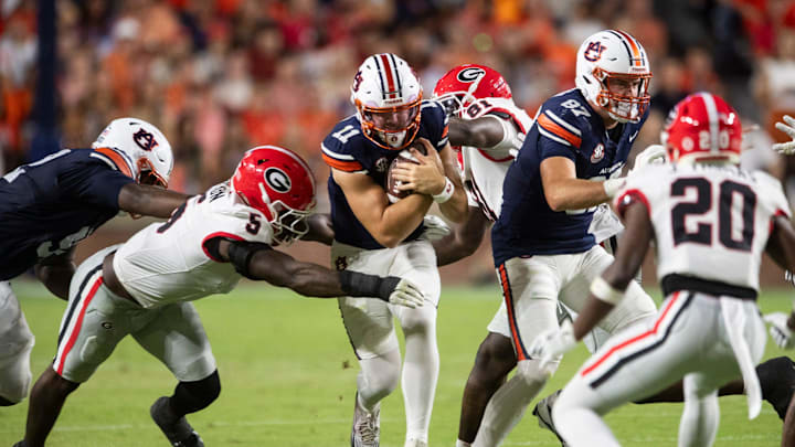 Auburn Tigers quarterback Jackson Arnold (11) runs the ball as Auburn Tigers take on Georgia Bulldogs at Jordan-Hare Stadium in Auburn, Ala. on Saturday, Oct. 11, 2025. Georgia Bulldogs defeated Auburn Tigers 20-10.