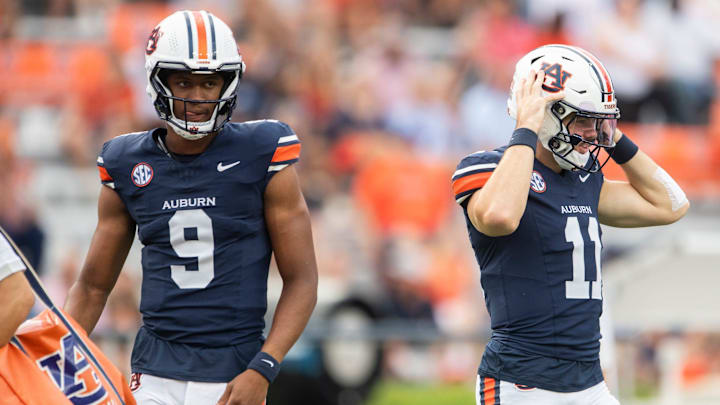Auburn Tigers quarterbacks Deuce Knight (9) and Jackson Arnold (11) during warm ups before Auburn Tigers take on Ball State Cardinals at Jordan-Hare Stadium in Auburn, Ala. on Saturday, Sept. 6, 2025.