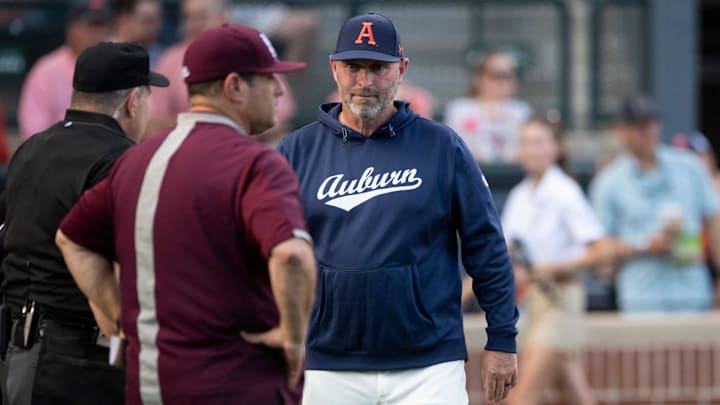 Mississippi State Bulldogs head coach Chris Lemonis and Auburn Tigers head coach Butch Thompson greet before the game as Auburn Tigers baseball takes on Mississippi State Bulldogs at Plainsman Park in Auburn, Ala., on Friday, April 25, 2025.
