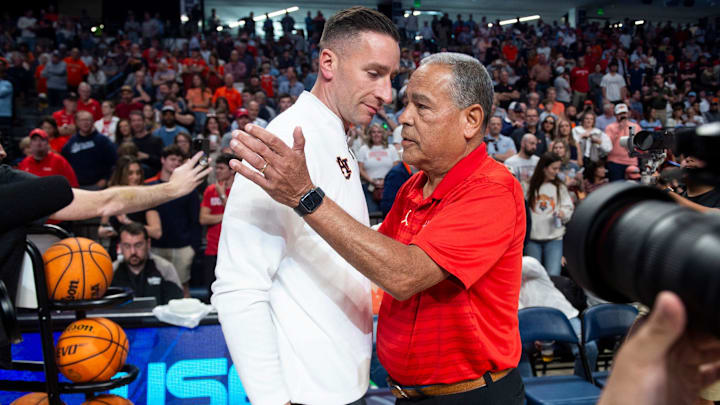 Auburn Tigers head coach Steven Pearl and Houston Cougars head coach Kelvin Sampson greet before Auburn Tigers take on the Houston Cougars at Legacy Arena in Birmingham, Ala. on Sunday, Nov. 16, 2025. Auburn Tigers head coach Steven Pearl and Houston Cougars head coach Kelvin Sampson greet before Auburn Tigers take on the Houston Cougars at Legacy Arena in Birmingham, Ala. on Sunday, Nov. 16, 2025.