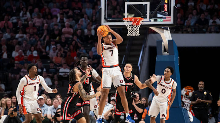 Auburn Tigers forward Keyshawn Hall grabs a rebound as Auburn Tigers take on the Houston Cougars