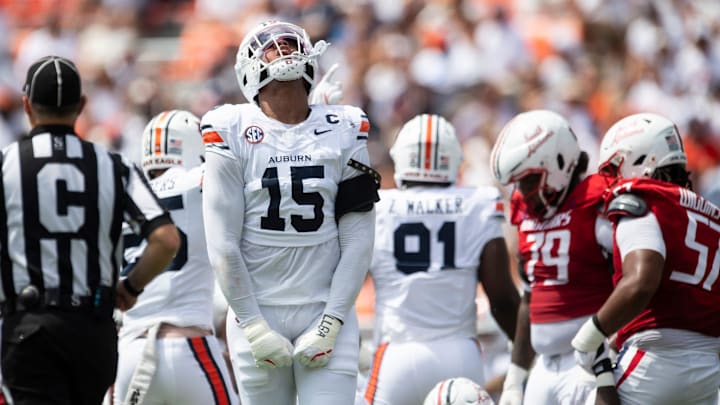 Auburn Tigers defensive end Keldric Faulk (15) celebrates a stop as Auburn Tigers take on South Alabama Jaguars at Jordan-Hare Stadium in Auburn, Ala. on Saturday, Sept. 13, 2025. Auburn Tigers lead South Alabama Jaguars 28-9 at halftime.