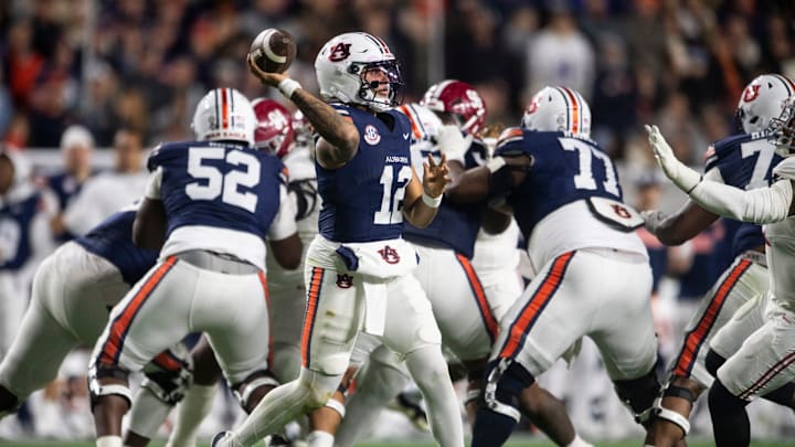 Auburn Tigers quarterback Ashton Daniels (12) throws the ball as Auburn Tigers take on Alabama Crimson Tide in the Iron Bowl at Jordan-Hare Stadium in Auburn, Ala. on Saturday, Nov. 29, 2025. Alabama Crimson Tide leads Auburn Tigers 17-6.