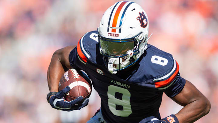 Auburn Tigers wide receiver Cam Coleman (8) turns upfield after a catch eventually scoring a touchdown as Auburn Tigers take on Louisiana-Monroe Warhawks at Jordan-Hare Stadium in Auburn, Ala., on Saturday, Nov. 16, 2024. Auburn Tigers lead Louisiana-Monroe Warhawks 24-0 at halftime.