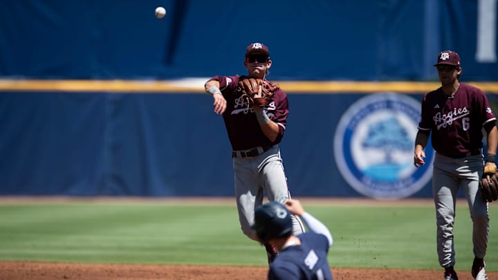 Texas A&M Aggies' Ben Royo (10) throws to first base to complete a double play as Auburn Tigers take on Texas A&M Aggies during the SEC baseball tournament at Hoover Met in Birmingham, Ala., on Thursday, May 22, 2025. Texas A&M Aggies' Ben Royo (10) throws to first base to complete a double play as Auburn Tigers take on Texas A&M Aggies during the SEC baseball tournament at Hoover Met in Birmingham, Ala., on Thursday, May 22, 2025.