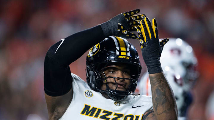 Missouri Tigers defensive tackle Chris McClellan (7) celebrates his sack as Auburn Tigers take on Missouri Tigers at Jordan-Hare Stadium in Auburn, Ala. on Saturday, Oct. 18, 2025. Missouri Tigers lead Auburn Tigers 10-7 at halftime.