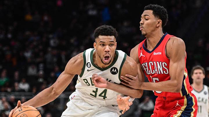 Jan 29, 2023; Milwaukee, Wisconsin, USA; Milwaukee Bucks forward Giannis Antetokounmpo (34) drives for the basket against New Orleans Pelicans forward Trey Murphy III (25) in the third quarter at Fiserv Forum. Mandatory Credit: Benny Sieu-Imagn Images