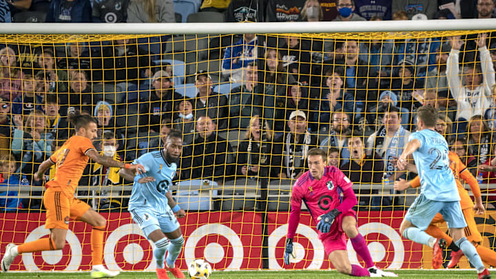 Sep 25, 2021; Saint Paul, Minnesota, USA; Houston Dynamo forward Maximiliano Urruti (37) shoots the