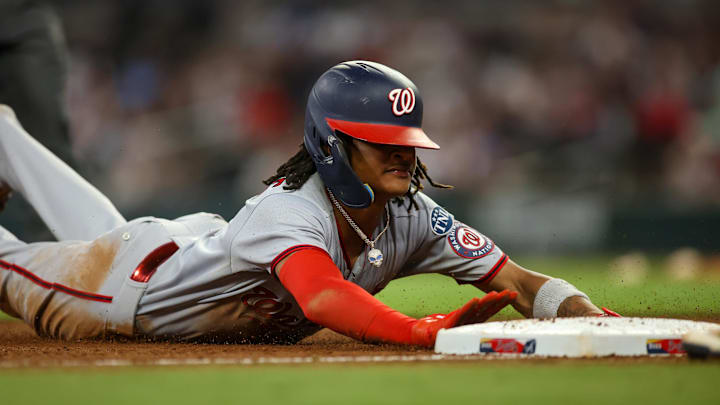 Sep 30, 2023; Atlanta, Georgia, USA; Washington Nationals shortstop CJ Abrams (5) slides safely into