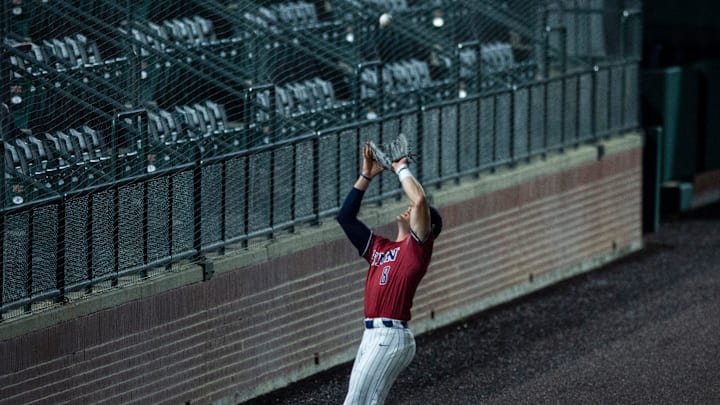 Penn Quakers Wyatt Henseler (8) catches a foul ball as Penn Quakers take on Southern Miss Golden Eagles during the NCAA baseball championship regional at Plainsman Park in Auburn, Ala., on Sunday, June 4, 2023.