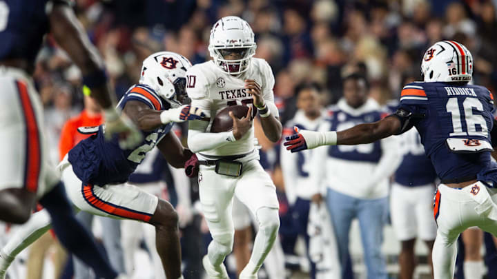 Texas A&M Aggies quarterback Marcel Reed (10) runs the ball as Auburn Tigers take on Texas A&M Aggies at Jordan-Hare Stadium in Auburn, Ala., on Saturday, Sept. 7, 2024.