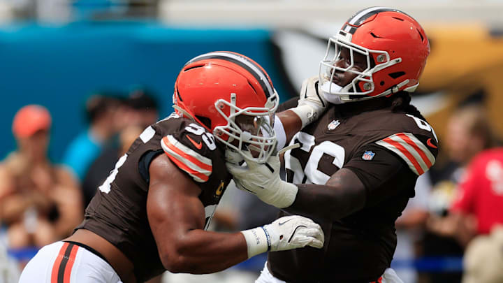 Cleveland Browns defensive end Myles Garrett (95), left, drills on offensive tackle James Hudson III (66) before an NFL football matchup Sunday, Sept. 15, 2024 at EverBank Stadium in Jacksonville, Fla. [Corey Perrine/Florida Times-Union]