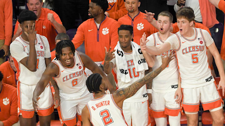 Feb 8, 2025; Clemson, South Carolina, USA; Clemson Tigers guard Dillon Hunter (2) reacts with teammates after making a three point shot against Duke Blue Devils during the second half at Littlejohn Coliseum. 