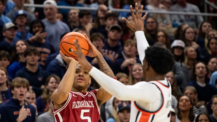 Arkansas Razorbacks guard Darius Acuff Jr. (5) takes a jump shot in a game against the Auburn Tigers at Neville Arena in Auburn, Ala.