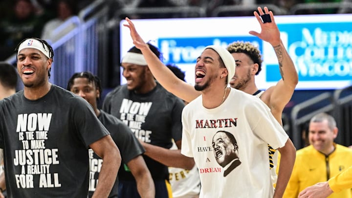 Jan 16, 2023; Milwaukee, Wisconsin, USA; Indiana Pacers guard Tyrese Haliburton (right) cheers from the bench in the second quarter against the Milwaukee Bucks at Fiserv Forum. Haliburton did not play due to an injury. Mandatory Credit: Benny Sieu-Imagn Images Jan 16, 2023; Milwaukee, Wisconsin, USA; Indiana Pacers guard Tyrese Haliburton (right) cheers from the bench in the second quarter against the Milwaukee Bucks at Fiserv Forum. Haliburton did not play due to an injury. Mandatory Credit: Benny Sieu-Imagn Images