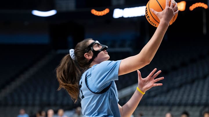North Carolina Tar Heels forward Ciera Toomey (21) goes up for a layup during practice before their Sweet 16 matchup with Duke at Legacy Arena in Birmingham, Ala., on Thursday, March 27, 2025. North Carolina Tar Heels forward Ciera Toomey (21) goes up for a layup during practice before their Sweet 16 matchup with Duke at Legacy Arena in Birmingham, Ala., on Thursday, March 27, 2025.