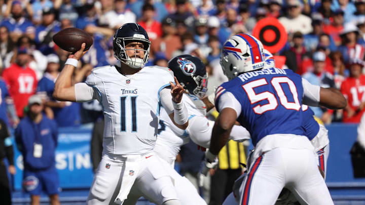 Bills Greg Rousseau tries to get to Titans quarterback Mason Rudolph during first half action at Highmark Stadium in Orchard Park on Oct. 20, 2024. Bills Greg Rousseau tries to get to Titans quarterback Mason Rudolph during first half action at Highmark Stadium in Orchard Park on Oct. 20, 2024.