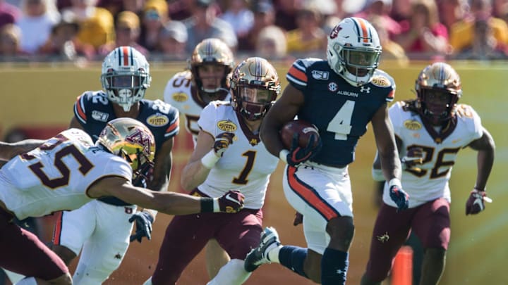 Auburn defensive back Noah Igbinoghene (4) returns a kickoff for a touchdown during the Outback Bowl at Raymond James Stadium in Tampa, Fla., on Wednesday, Jan. 1, 2020. Minnesota leads Auburn 24-17 at halftime.

Jc Outbackbowl 41