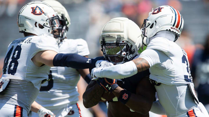 Auburn Tigers running back Damari Alston (0) runs the ball during Auburn Tigers A-Day football practice at Jordan-Hare Stadium in Auburn, Ala., on Saturday, April 12, 2025.