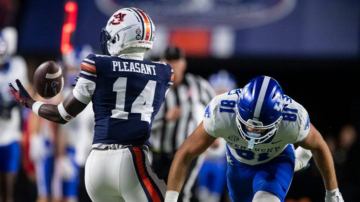 Auburn Tigers defensive back Rayshawn Pleasant (14) bobbles a would-be interception against Kentucky this past season. Auburn Tigers defensive back Rayshawn Pleasant (14) bobbles a would-be interception against Kentucky this past season.