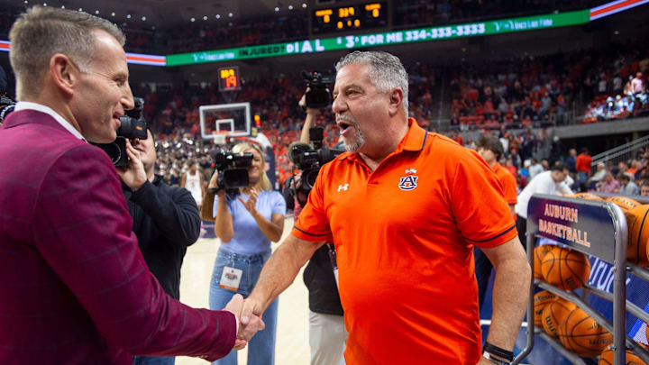 Alabama coach Nate Oats (left) and Auburn coach Bruce Pearl shake hands before a game at Neville Arena on Feb. 7, 2024. Alabama coach Nate Oats (left) and Auburn coach Bruce Pearl shake hands before a game at Neville Arena on Feb. 7, 2024.