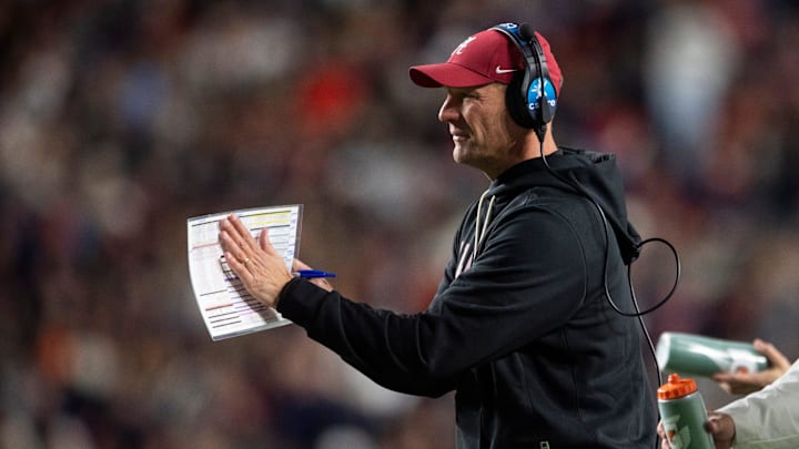 Alabama Crimson Tide head coach Kalen DeBoer encourages his team as Auburn Tigers take on Alabama Crimson Tide in the Iron Bowl at Jordan-Hare Stadium in Auburn, Ala. on Saturday, Nov. 29, 2025. Alabama Crimson Tide leads Auburn Tigers 17-6.