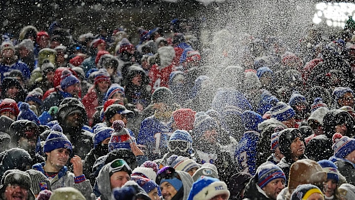 Bills fans throw snow in the air in celebration after James Cook ran 65-yards for a touchdown during first half action of their home game against the San Francisco 49ers in Orchard Park on Dec. 1, 2024. Bills fans throw snow in the air in celebration after James Cook ran 65-yards for a touchdown during first half action of their home game against the San Francisco 49ers in Orchard Park on Dec. 1, 2024.