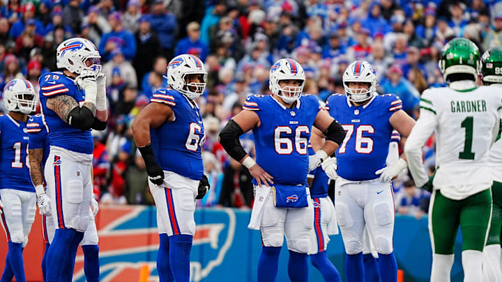 Buffalo Bills offensive tackle Spencer Brown (79), Buffalo Bills guard O'Cyrus Torrence (64), Buffalo Bills guard Connor McGovern (66) and Buffalo Bills guard David Edwards (76) get ready to line up during first half action at the Bills home game against the New York Jets at Highmark Stadium in Orchard Park on Dec. 29, 2024.