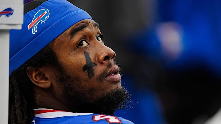 Buffalo Bills running back James Cook (4) takes a breather while the defensive line is on the field during the second half of the Bills' home game against the New York Jets at Highmark Stadium in Orchard Park on Dec. 29, 2024.