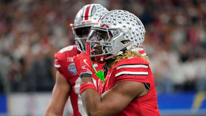 Ohio State Buckeyes running back Quinshon Judkins (1) celebrates his touchdown run against Texas Longhorns in the fourth quarter of the Cotton Bowl Classic during the College Football Playoff semifinal game at AT&T Stadium in Arlington, Texas on January, 10, 2025.