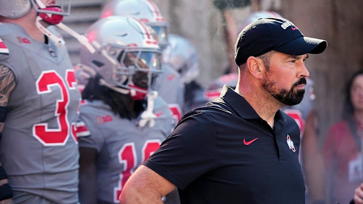 Ohio State Buckeyes head coach Ryan Day waits to take the field against Iowa Hawkeyes during the NCAA football game at Ohio Stadium.