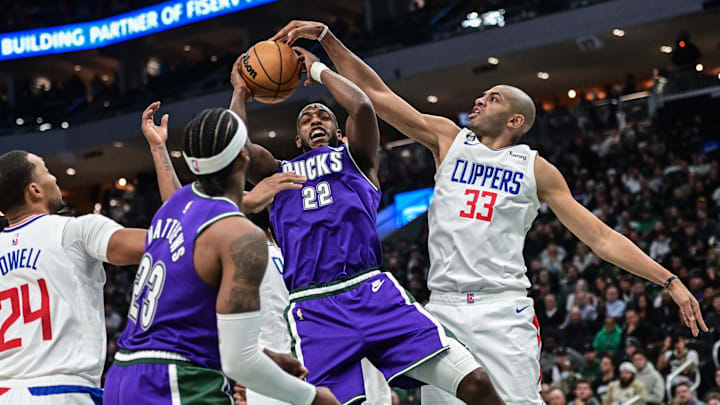 Feb 2, 2023; Milwaukee, Wisconsin, USA; Milwaukee Bucks forward Khris Middleton (22) takes a shot against Los Angeles Clippers forward Nicolas Batum (33) in the third quarter at Fiserv Forum. Mandatory Credit: Benny Sieu-Imagn Images Feb 2, 2023; Milwaukee, Wisconsin, USA; Milwaukee Bucks forward Khris Middleton (22) takes a shot against Los Angeles Clippers forward Nicolas Batum (33) in the third quarter at Fiserv Forum. Mandatory Credit: Benny Sieu-Imagn Images