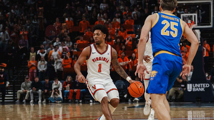 Feb 3, 2026; Charlottesville, Virginia, USA; Virginia Cavaliers guard Malik Thomas (1) brings the ball up court in the second half against the Pittsburgh Panthers at John Paul Jones Arena. Mandatory Credit: Emily Faith Morgan-Imagn Images